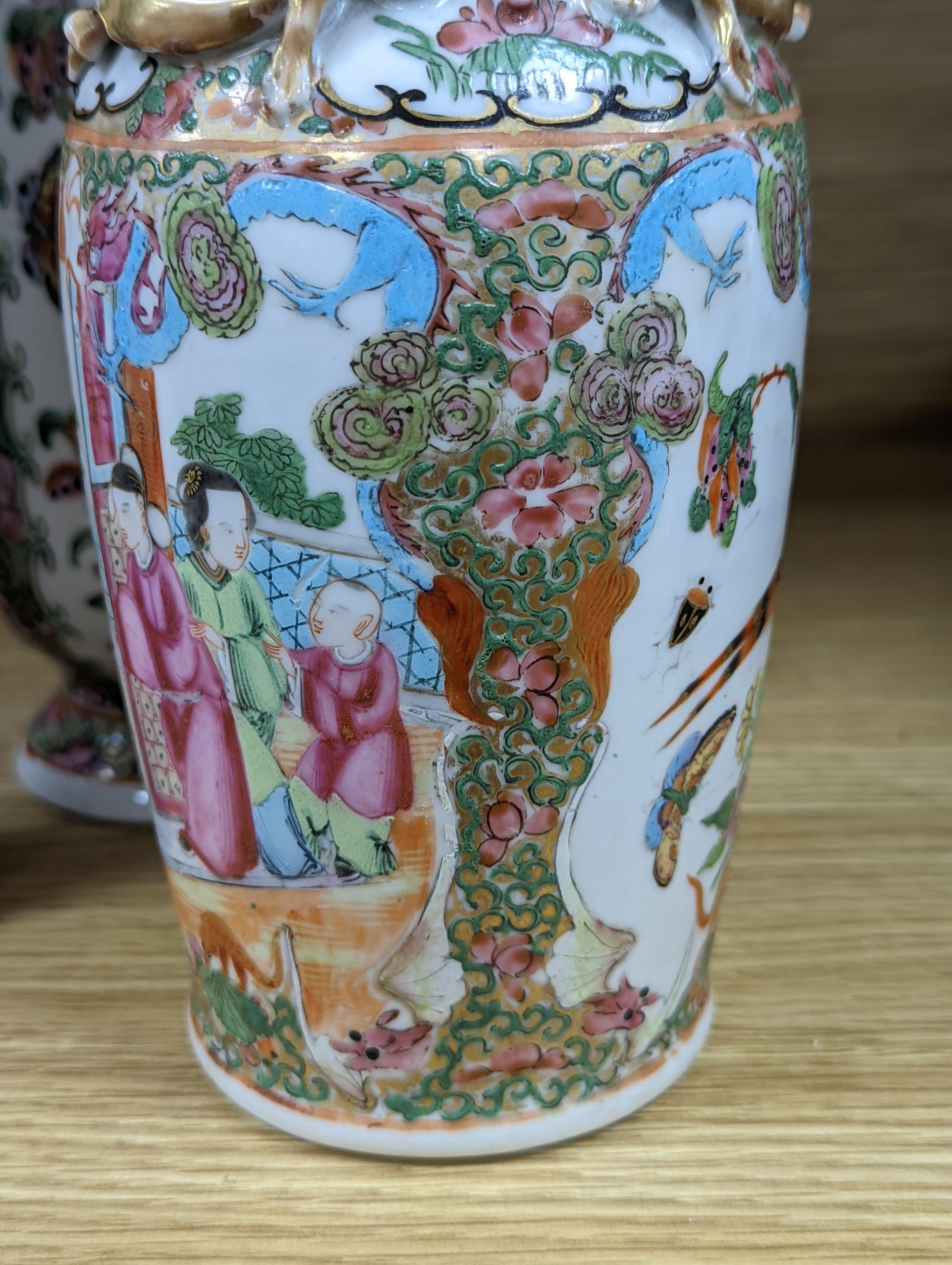 Two Chinese famille rose vases, late 19th century, tallest 26 cm, one wood stand, some restoration